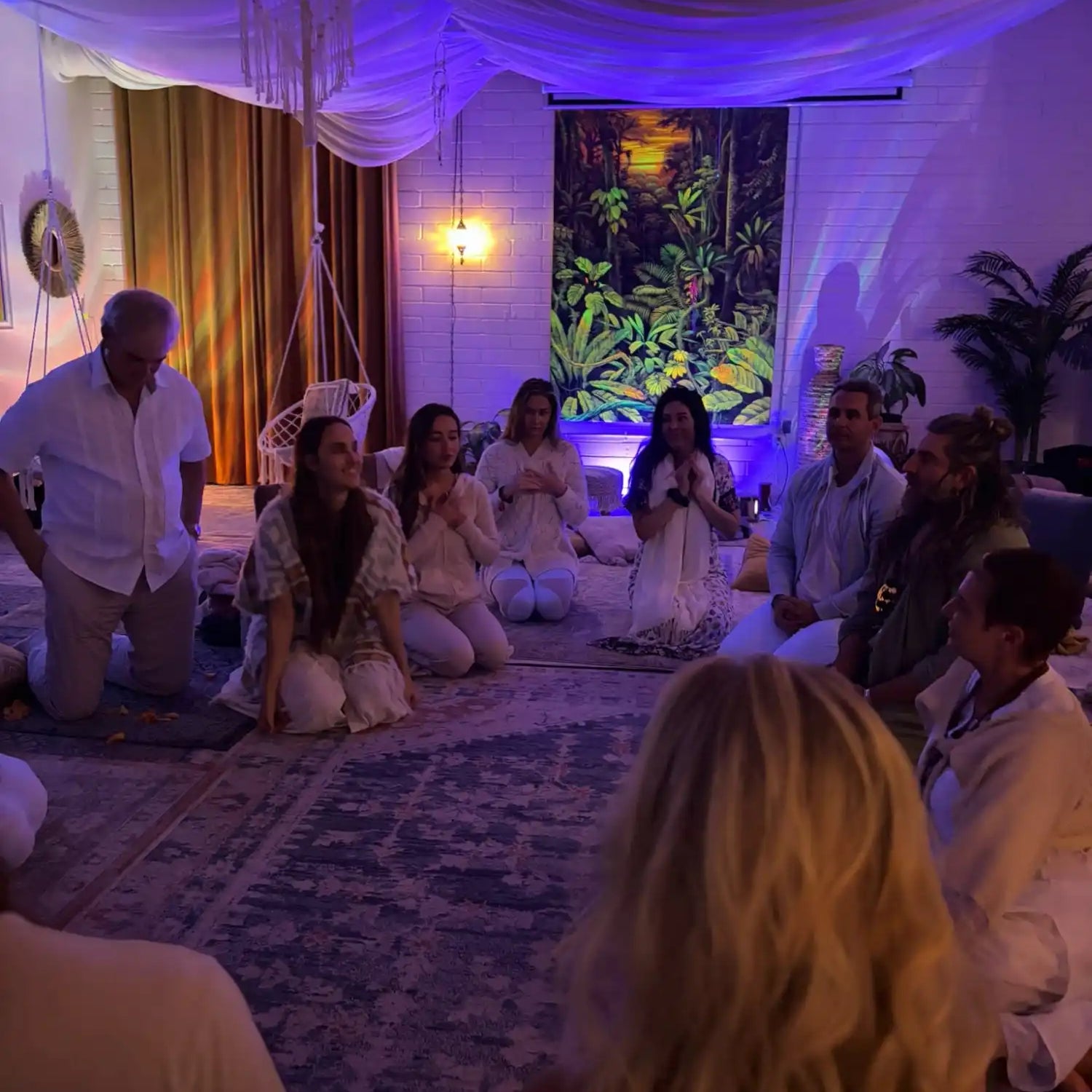 Group of people in a circle.