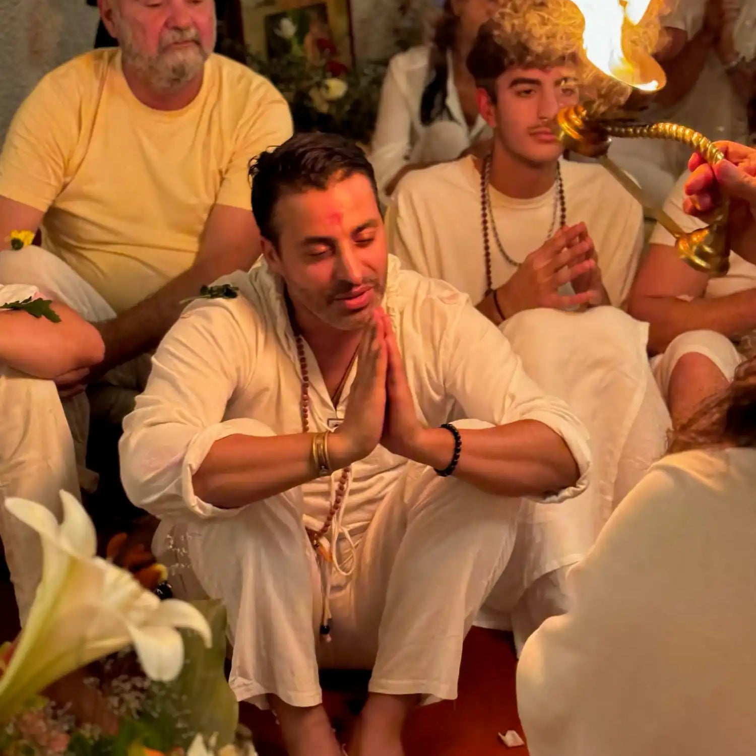 Group of people in prayer.