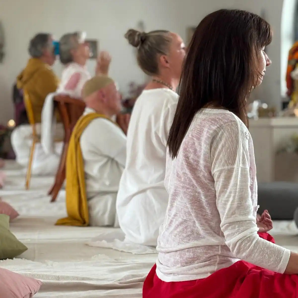 People in meditation or yoga class.