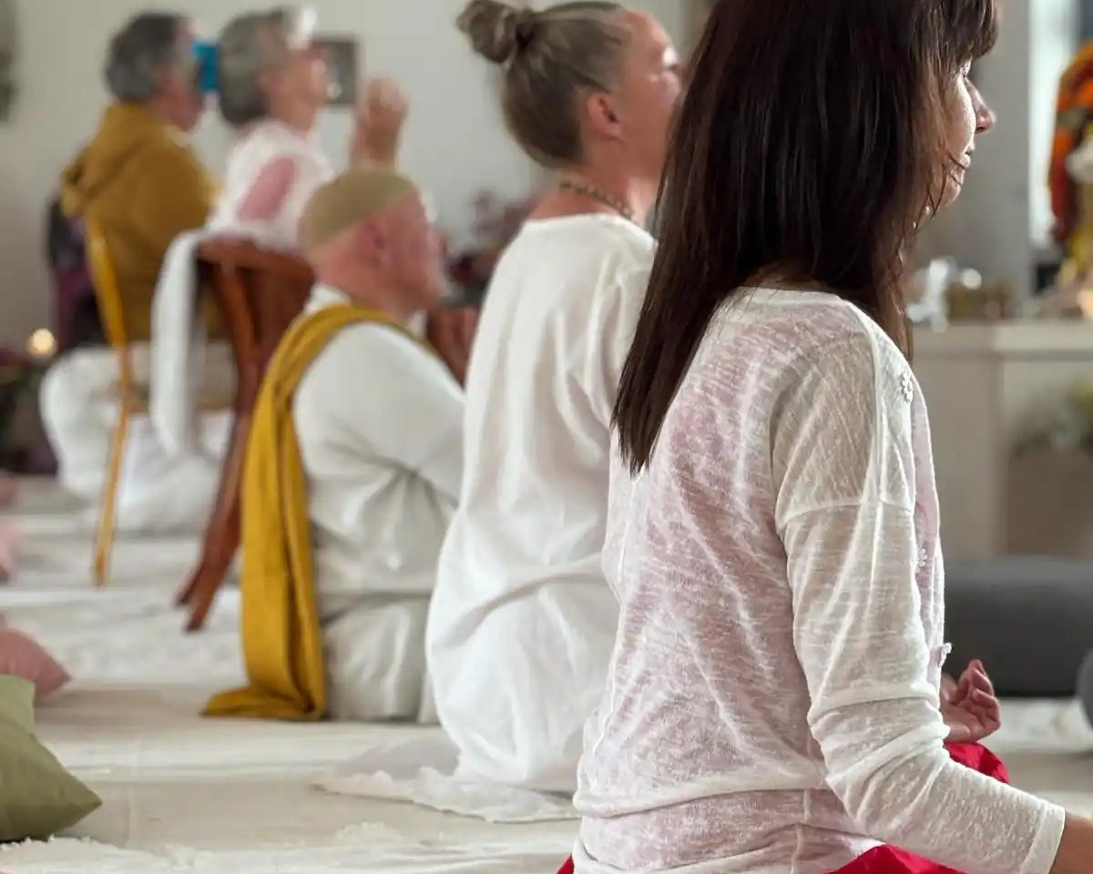 People in meditation or yoga class.