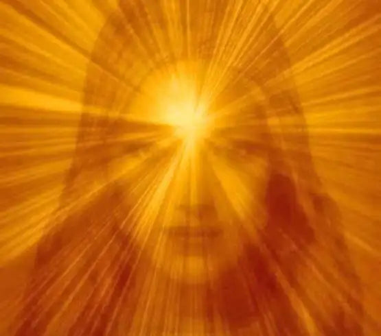 A radiant golden aura envelops a face, glowing with intense light rays emanating from the center.