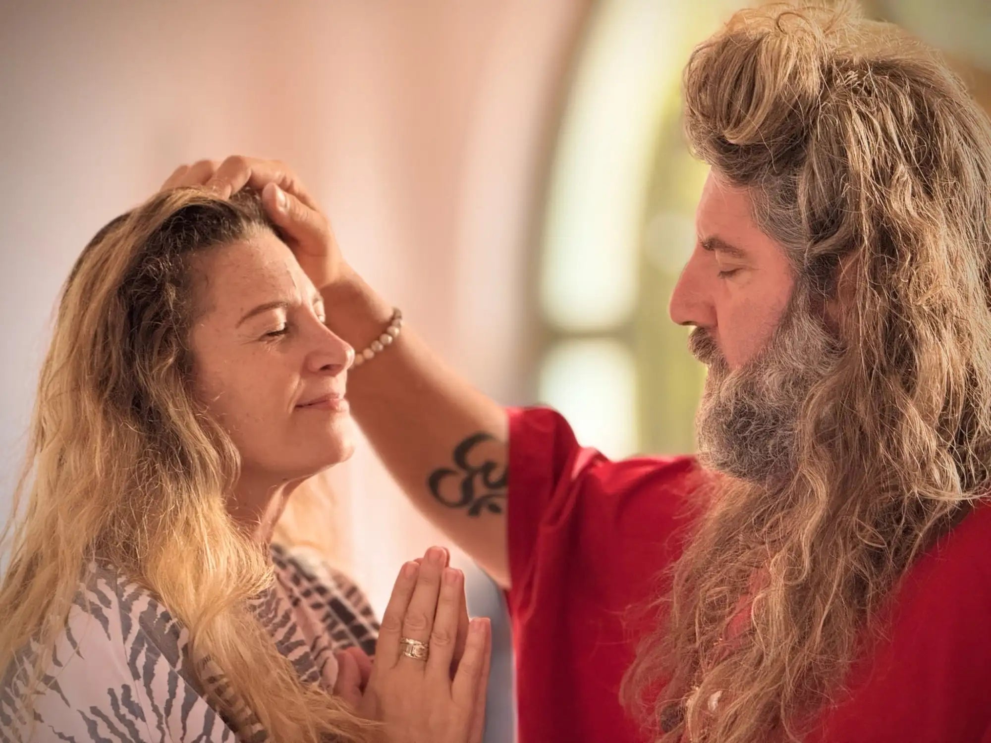 Red long-sleeved shirt with white trim and pocket detail.