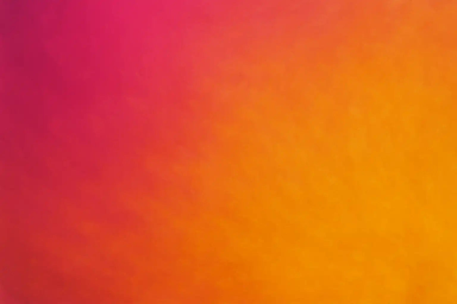 A smooth color gradient from fuchsia to orange.